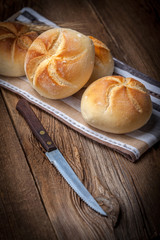 Several kaiser rolls.