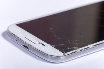 Crashed lcd touch screen on the white mobile phone
