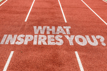 What Inspires You? written on running track