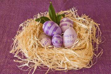 Easter eggs in a straw nest