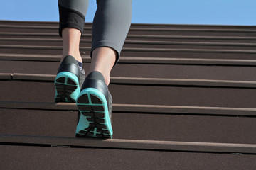 Female athlete running on stairs close up. Running, jogging, sport, fitness, active lifestyle concept