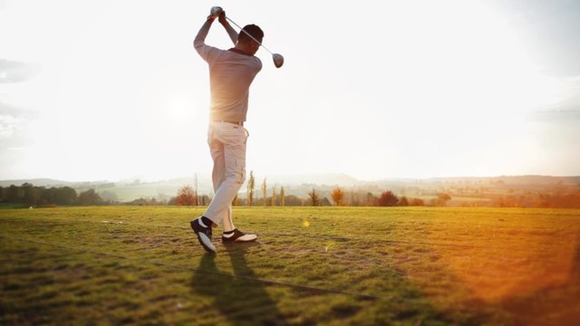 Playing Golf on beautiful summer morning