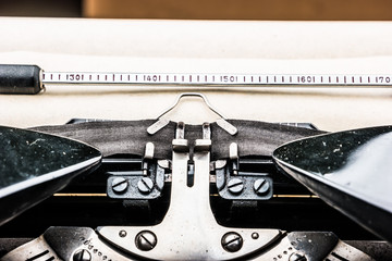 Old typewriter on table.