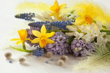 Spring bouquet of flowers hyacinths and daffodils on table