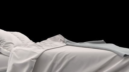 Bed with pillows and a blanket