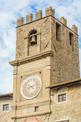 Fototapeta na wymiar The clock tower of the medieval palace of Cortona.