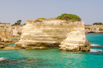 Scenic rocky cliffs of Torre Sant Andrea, Salento, Italy