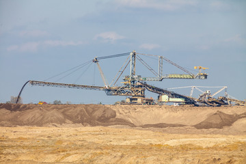 Fototapeta premium Opencast brown coal mine. Giant excavator.