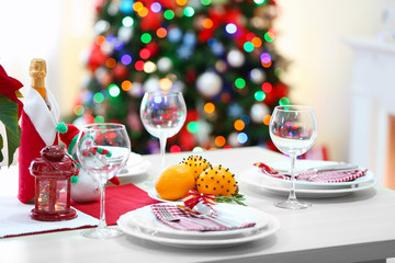 Christmas table setting on light room background
