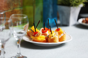 Delicious canape on the kitchen table, close up