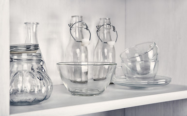 Glass dishes on shelf in the kitchen