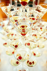 Celebration. Pyramid of champagne glasses.