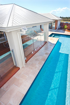 Top view of the modern and luxury swimming pool of a hotel or ho