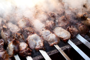 beef and pork steak bbq on the grill