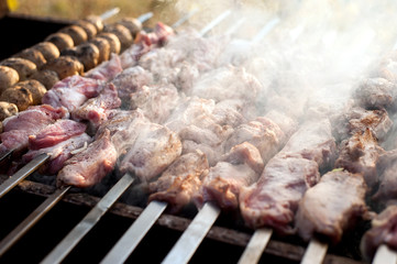 beef and pork steak bbq on the grill