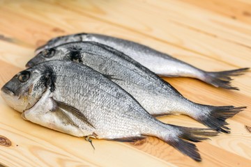 Fish on wooden background
