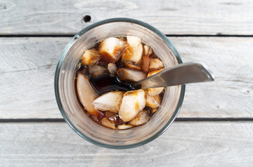 Vietnamese ice coffee on a wooden table