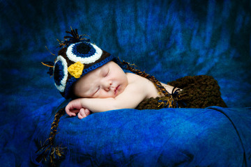 Infant Sleeping Wearing Owl Hat