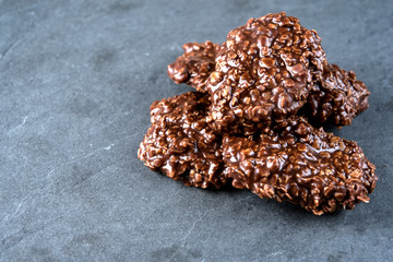 Organic peanut butter & Chocolate No Bake Cookies on a stone cutting board
