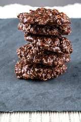 Organic peanut butter & Chocolate No Bake Cookies on a stone cutting board