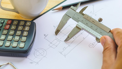 measurement dimension drawing in paper by vernier calipers