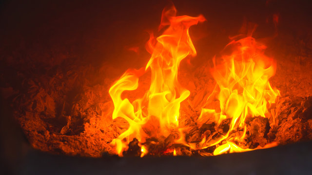 Burning fire paper in the brick furnace