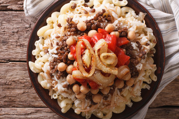 Egyptian Cuisine: kushari close-up on the plate. horizontal top view
