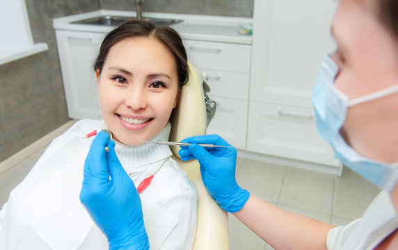 Young female patient at dentist office