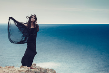 Portrait of beautiful young lady. Outdoors. Smoky eyes.