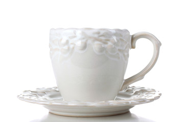 very beautiful porcelain Cup with saucer on white background isolated