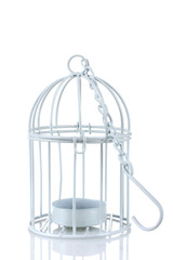 Fototapeta na wymiar small white cage with a hook standing on a white isolated background