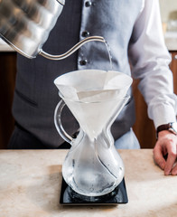 barista making coffee