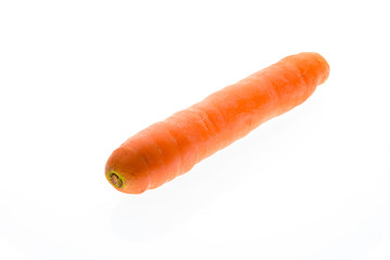 Organic big ripe fresh carrot isolated on white background.
