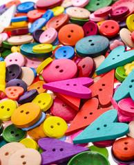 Different shape and colors sewing buttons background. Colorful t