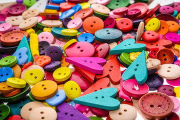 Different shape and colors sewing buttons background. Colorful t