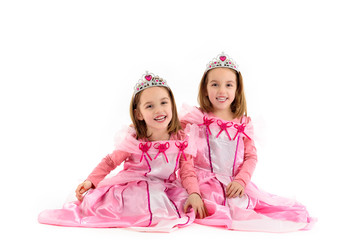 Little Twin Girls are dressed as princess in pink
