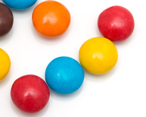 colorful round candy on a white background