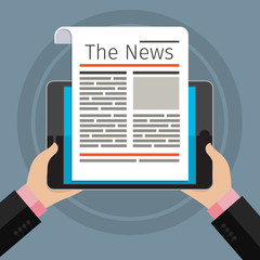 Businessman reading news at digital tablet.