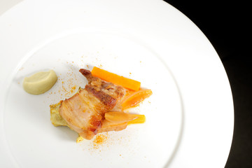 Plated freshly grilled pork bellies with vegetable