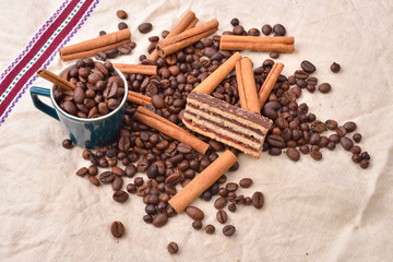 Sweet food. Black beans coffee and chocolate cake with cinnamon