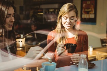 Friends chatting over coffee