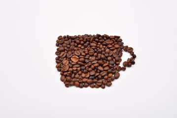Coffee cup image made up of coffee beans on a white background