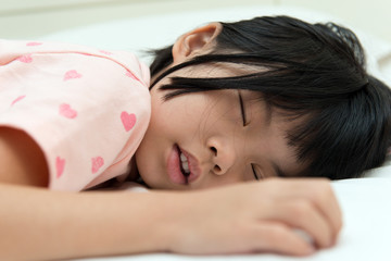 Obraz na płótnie Canvas Asian child sleeping