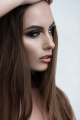 Naklejka premium Pretty young sexy street fashion sensual woman posing outside dr