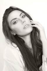 Obraz premium Close-up of beautiful wet woman face with water drop. On green b