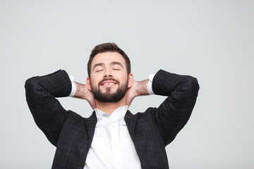 Happy businessman relaxing
