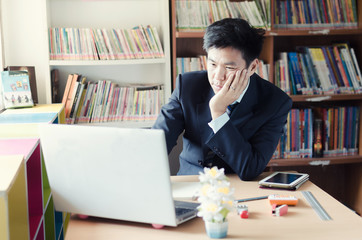 Businessman working on desk , thinking