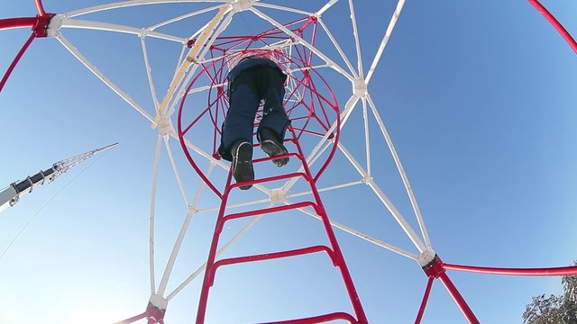 The cell tower. The construction of cell towers in the forest. The height of 50 meters. The work of the mountaineers. Winter. forest. A large crane. Very cold. Snow around.