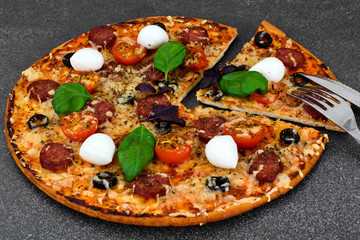 Pepperoni Pizza with Sausage, Cheese, Mozzarella, Olives and Bas