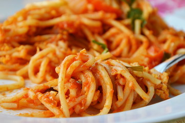 stir-fried spaghetti with egg and ketchup roll over fork